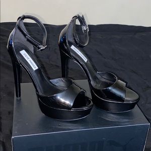 Black patent leather platform stilettos